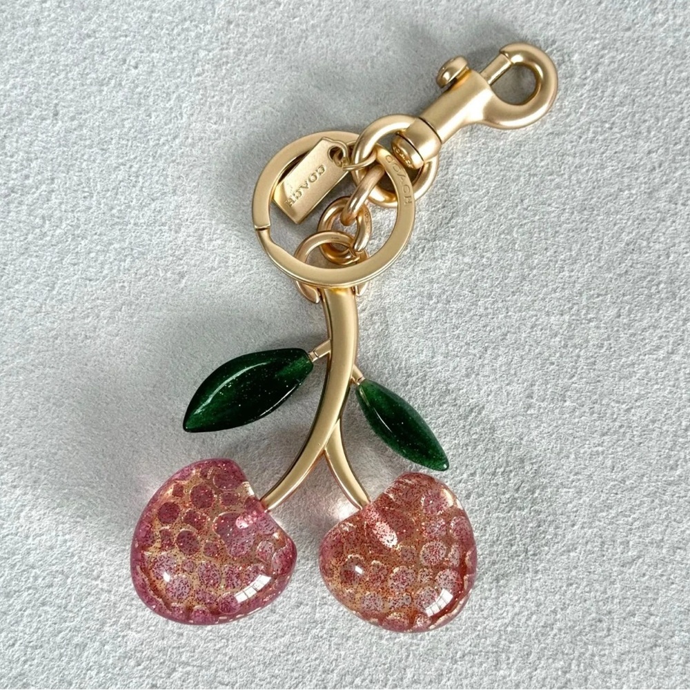 Coach Gold-Tone Cherry Cluster Bag Charm with Pink Glass & Green Enamel Leaves
